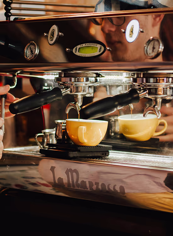 Espresso machine brewing coffee